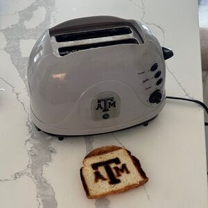 A&M Gray Toaster (brands logo on toast) 🍞